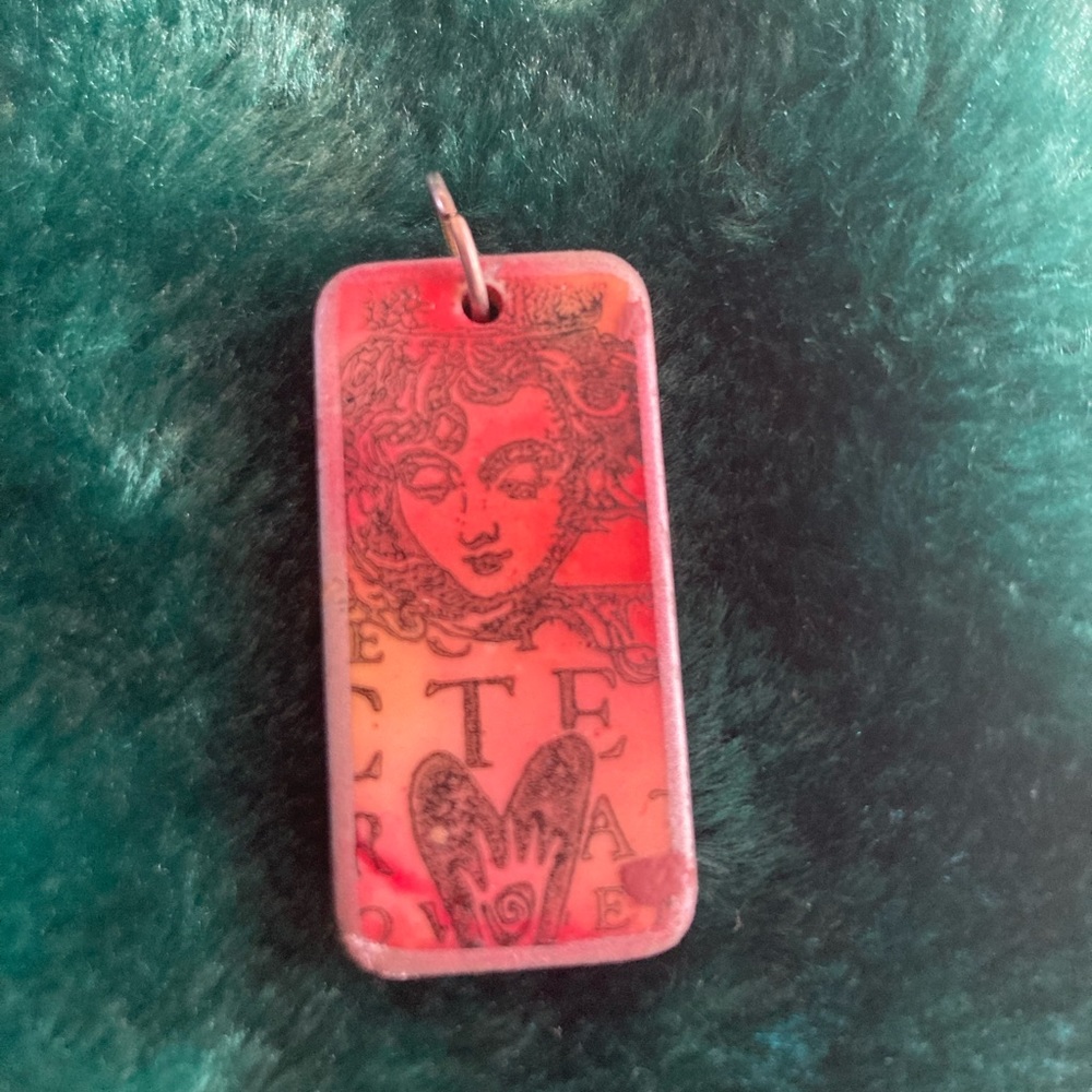 Domino Cherub Pendant